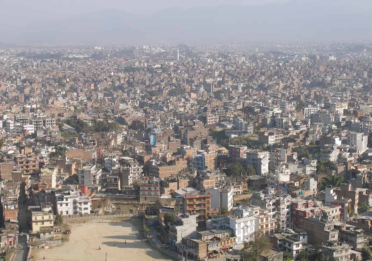 View across Kathmandu from Swayambhunath. Location context only; this is not a photograph of the Compassion in Everyday Life event.
