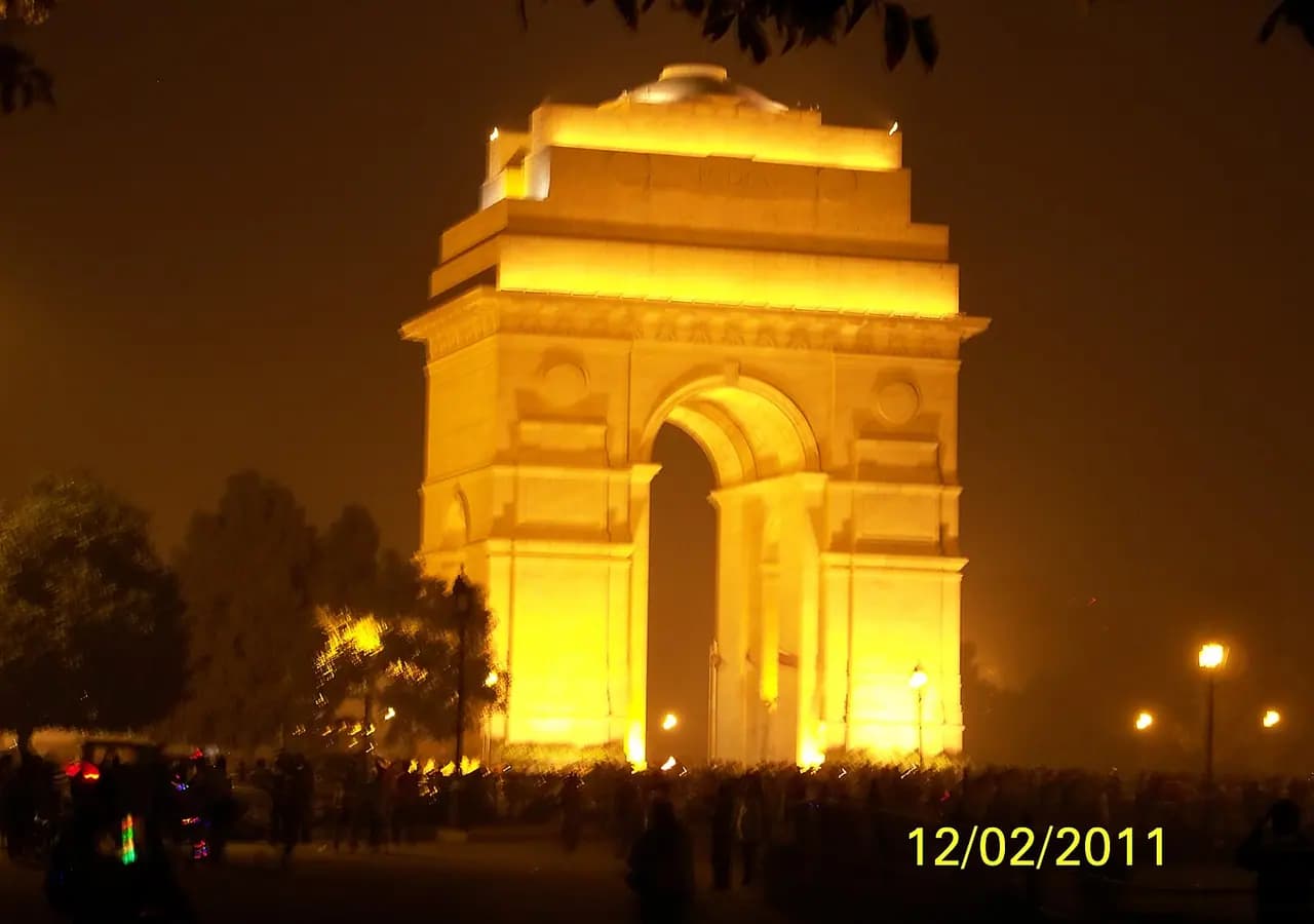 India Gate illuminated at night in New Delhi. Location context only; this is not a portrait of Gurdeep N Dhillon.